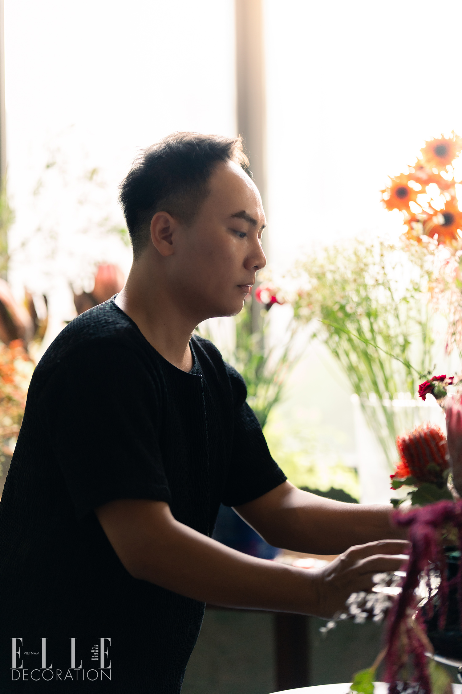 Son Tran florist nghe si cam hoa