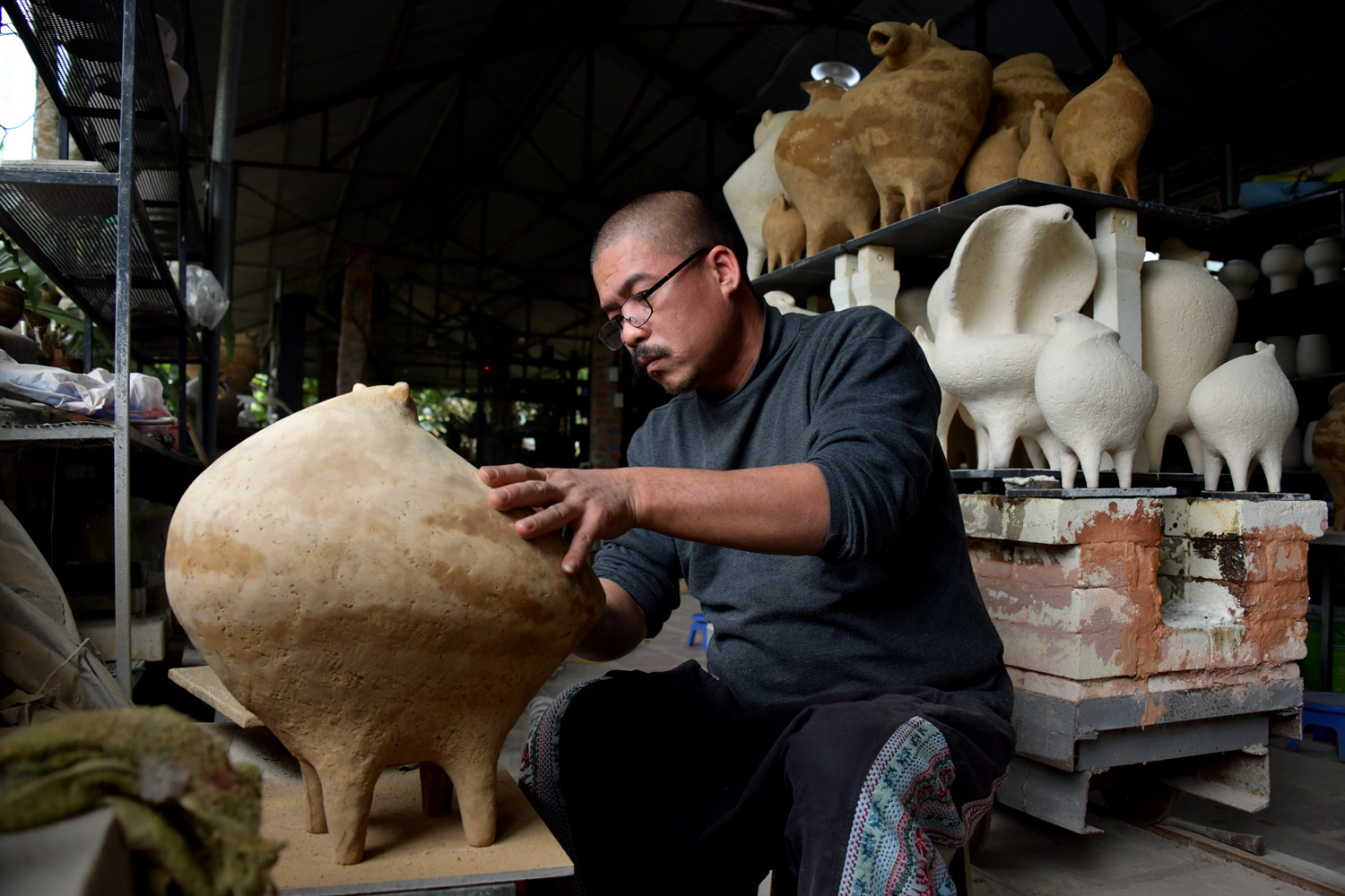 Hieu Muong con giap gom dieu khac